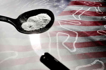 Cooking fentanyl on American flag background with chalk deadlines.