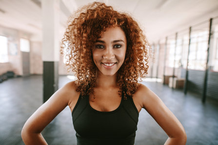 Young black woman smiling after exercise