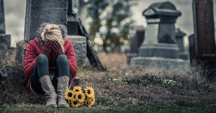 Woman at cemetery